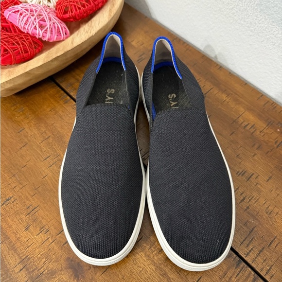 Rothy's Shoes - Rothy's The Original Slip On Sneaker in black solid with blue trim